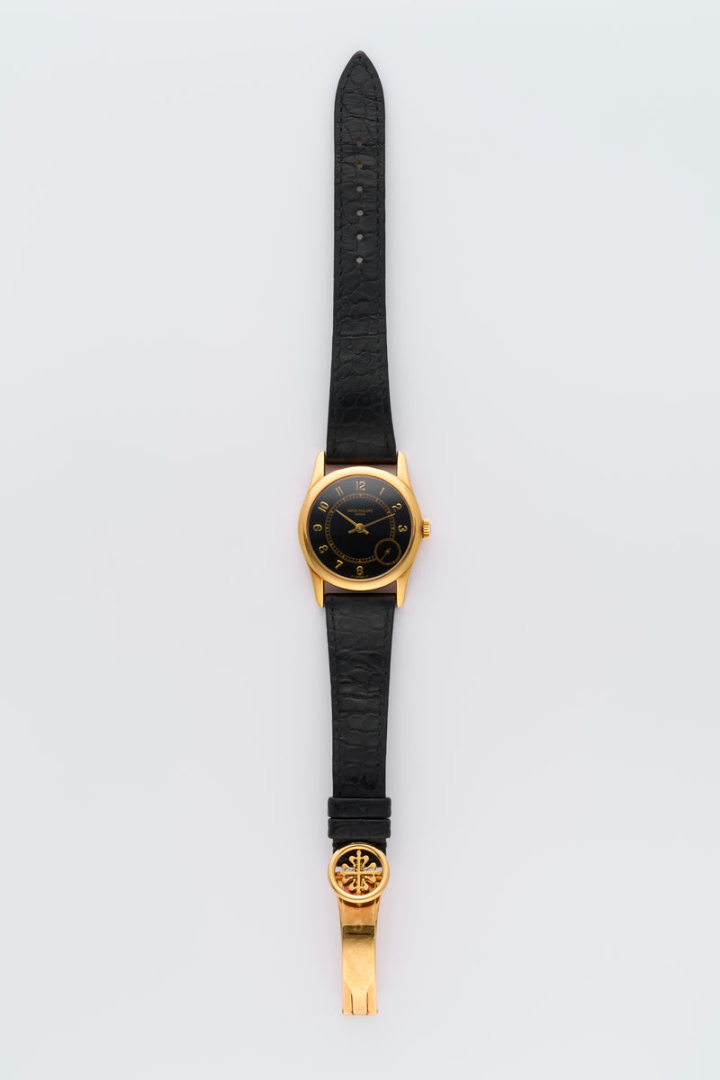 1990s Patek Philippe Calatrava 18k Yellow Gold Black Dial 5000J