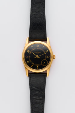 1990s Patek Philippe Calatrava 18k Yellow Gold Black Dial 5000J