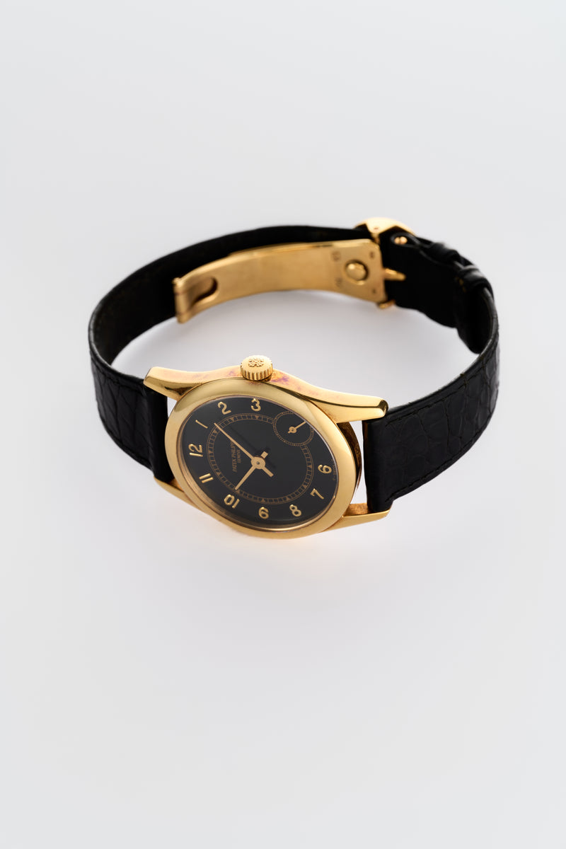 1990s Patek Philippe Calatrava 18k Yellow Gold Black Dial 5000J