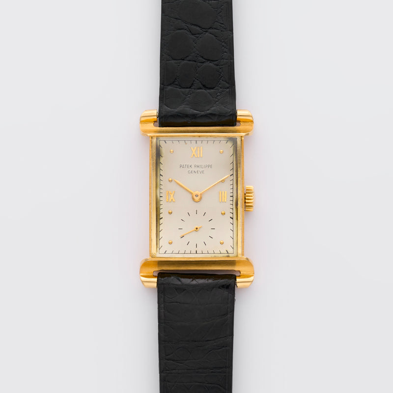 1940s Patek Philippe Rectangular Scroll lugs 18k Yellow Gold Silvered Dial 1580