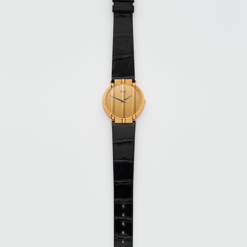 NOS 1990s Piaget Polo 18k Yellow Gold Gold Dial 8673