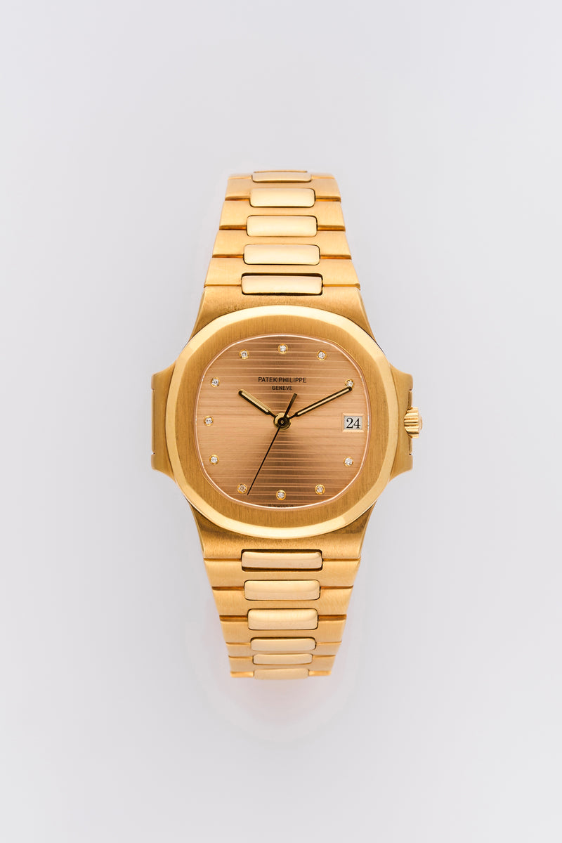 1990s Patek Philippe Nautilus 18k Yellow Gold Diamond-set Gold Dial 3800J