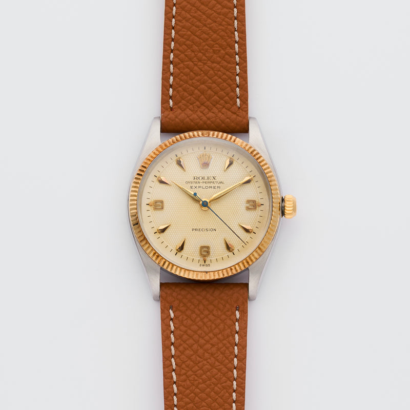 1959 Rolex Oyster Perpetual Gold/Steel Canadian Explorer Honeycomb Creme dial 5501