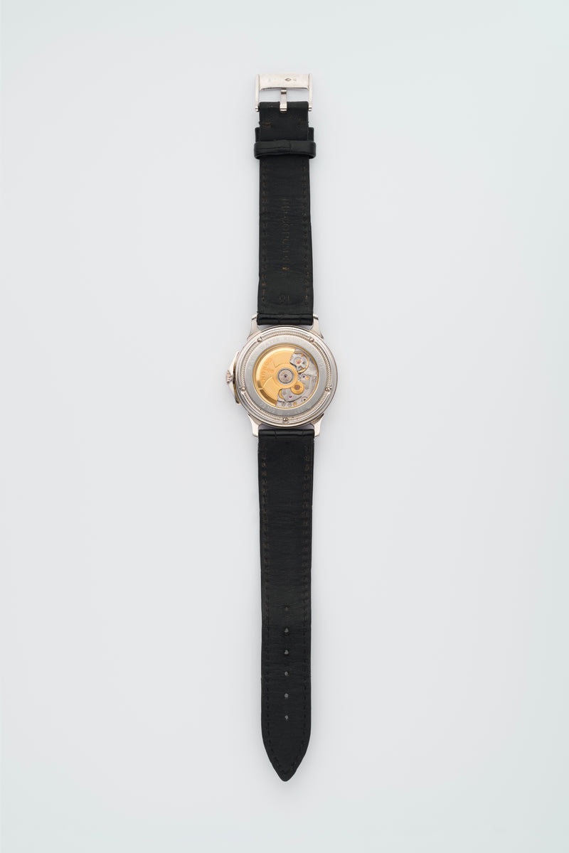 1990s Corum Platinum Réserve de marche Calendar Diamond-Set Bezel Silvered Guilloché Dial 73.109.79