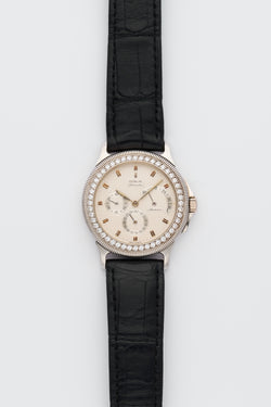 1990s Corum Platinum Réserve de marche Calendar Diamond-Set Bezel Silvered Guilloché Dial 73.109.79