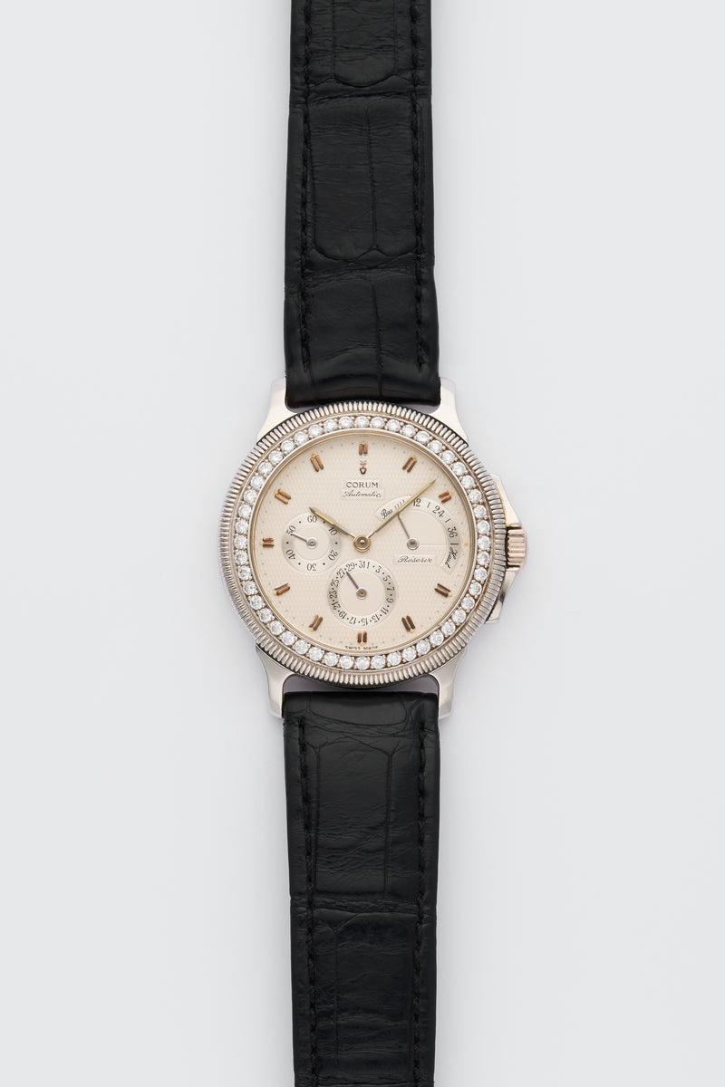 1990s Corum Platinum Réserve de marche Calendar Diamond-Set Bezel Silvered Guilloché Dial 73.109.79