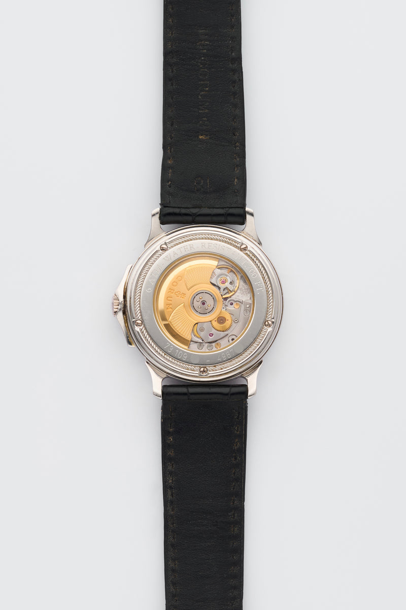 1990s Corum Platinum Réserve de marche Calendar Diamond-Set Bezel Silvered Guilloché Dial 73.109.79