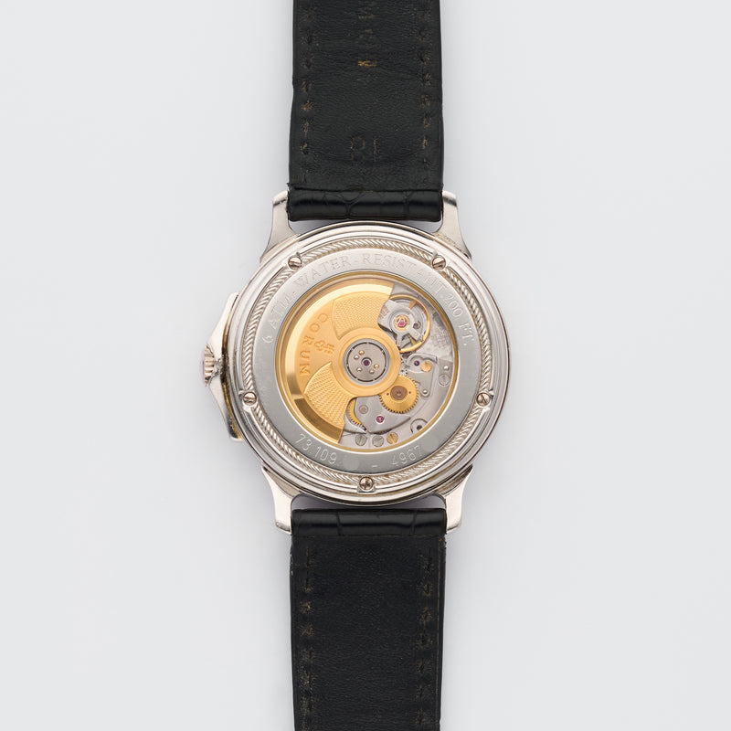 1990s Corum Platinum Réserve de marche Calendar Diamond-Set Bezel Silvered Guilloché Dial 73.109.79