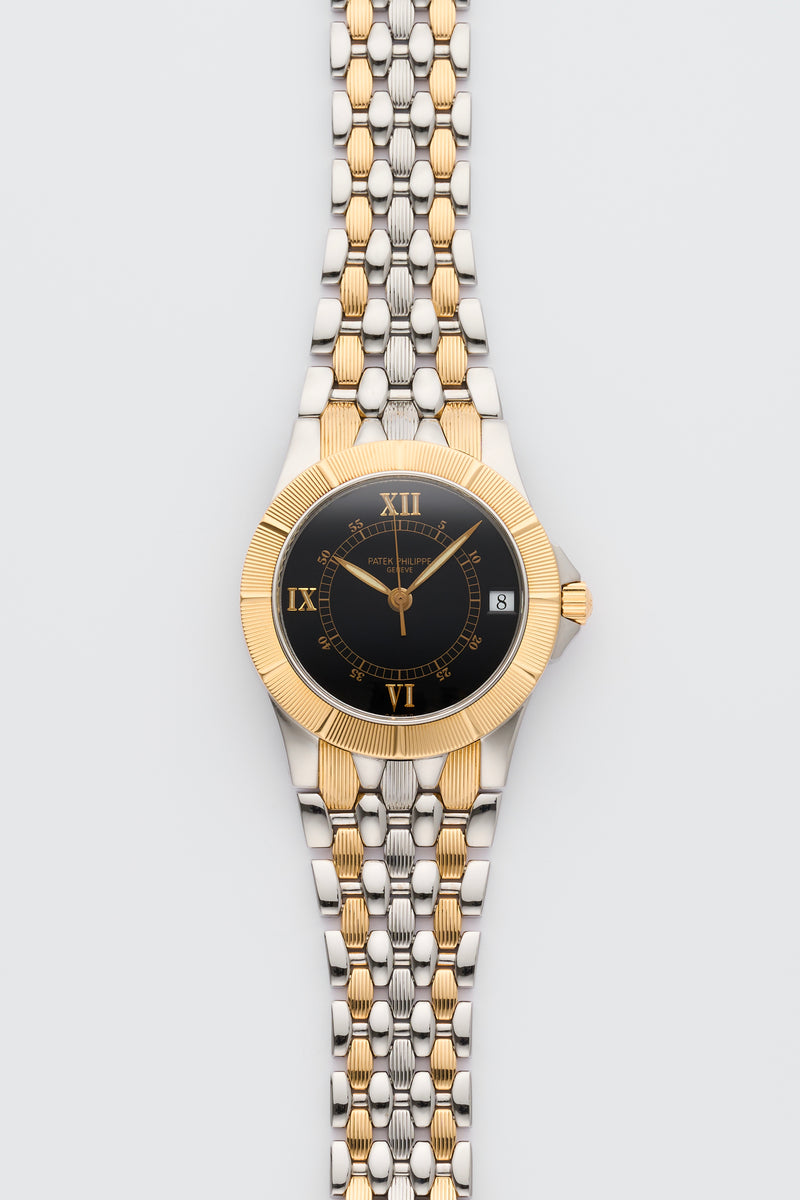 1990s Patek Philippe Neptune Gold/steel Black Dial 5080