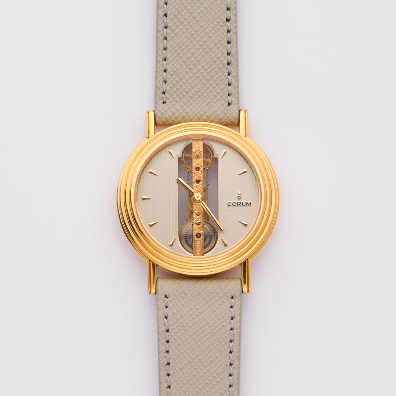 1990s Corum Bridge Skeleton 18k Yellow Gold Triple Step Case 13.240.58