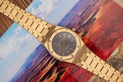 1980s Audemars Piguet Royal Oak 18k Yellow Gold Grey Dial 4100BA