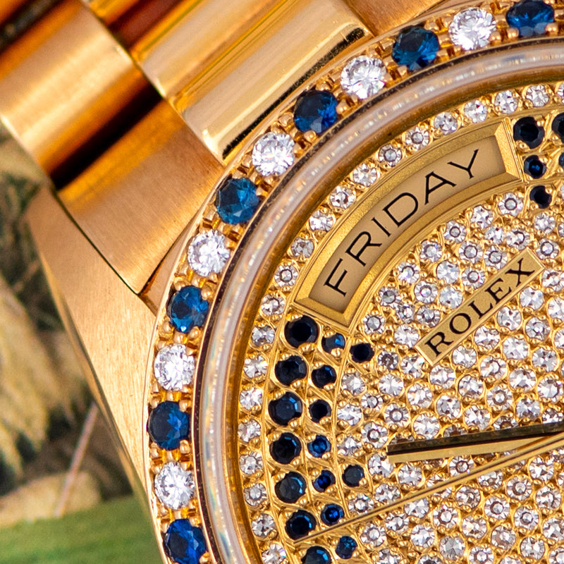 1986 Rolex Oyster Perpetual Day-Date 18k Yellow Gold Pavé diamonds and sapphire strings dial 18148