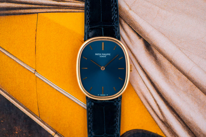 1970s Patek Philippe Ellipse 18k Yellow Gold Blue Dial 3648