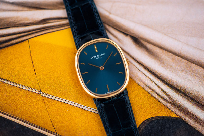 1970s Patek Philippe Ellipse 18k Yellow Gold Blue Dial 3648