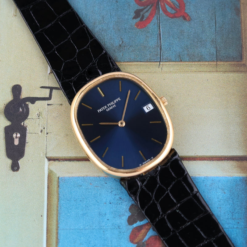 1980s Patek Philippe Ellipse 18k Yellow Gold Blue Dial 3788