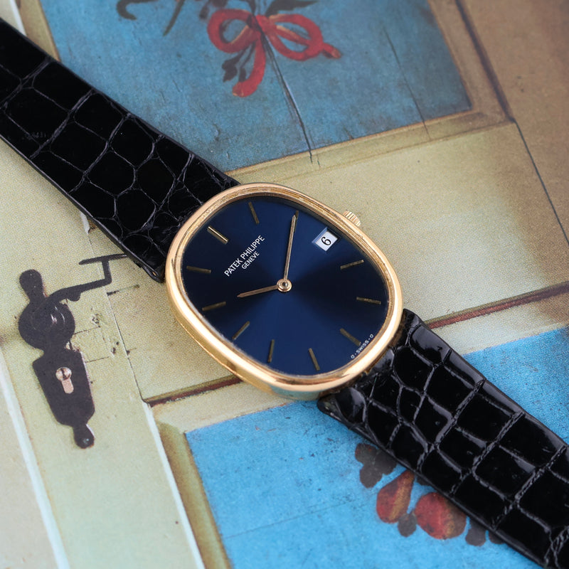 1980s Patek Philippe Ellipse 18k Yellow Gold Blue Dial 3788