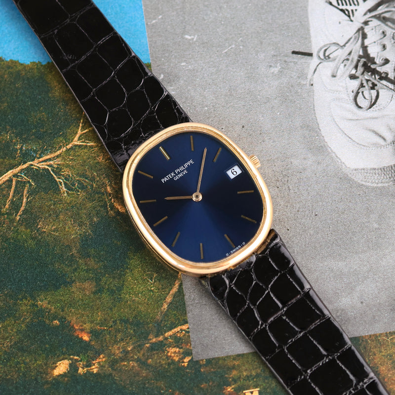 1980s Patek Philippe Ellipse 18k Yellow Gold Blue Dial 3788