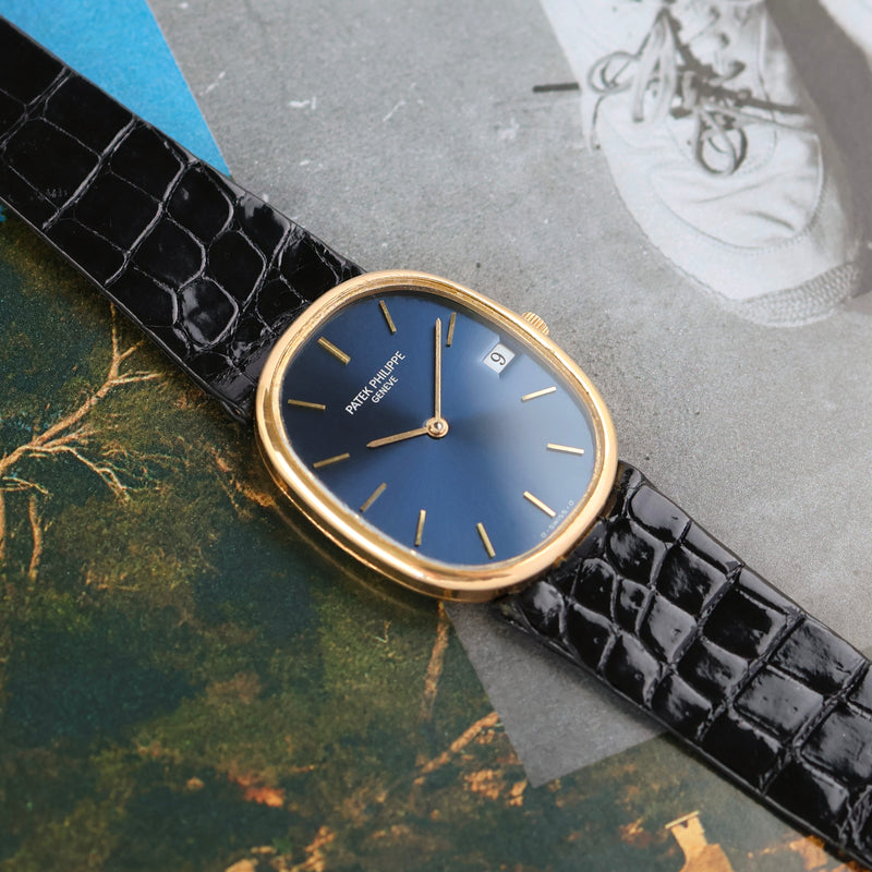 1980s Patek Philippe Ellipse 18k Yellow Gold Blue Dial 3788