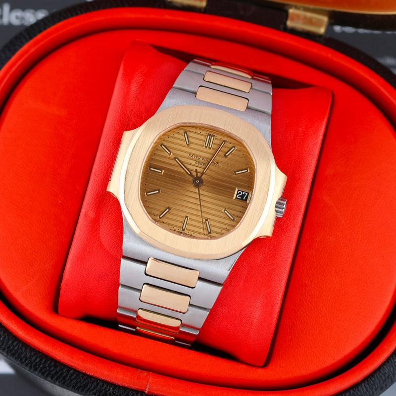1982 Patek Philippe Nautilus 18k Yellow Gold/Steel Gilded Dial with Black Date disc 3800 with Extract from the Archives