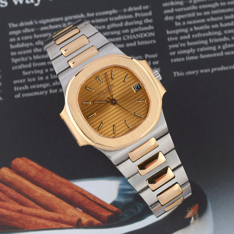 1982 Patek Philippe Nautilus 18k Yellow Gold/Steel Gilded Dial with Black Date disc 3800 with Extract from the Archives