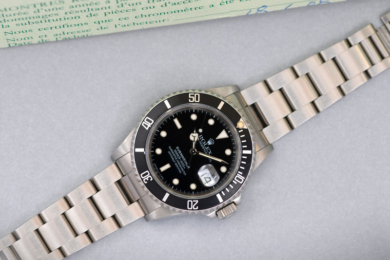 1991 Rolex Oyster Perpetual Submariner Date 16610 with papers