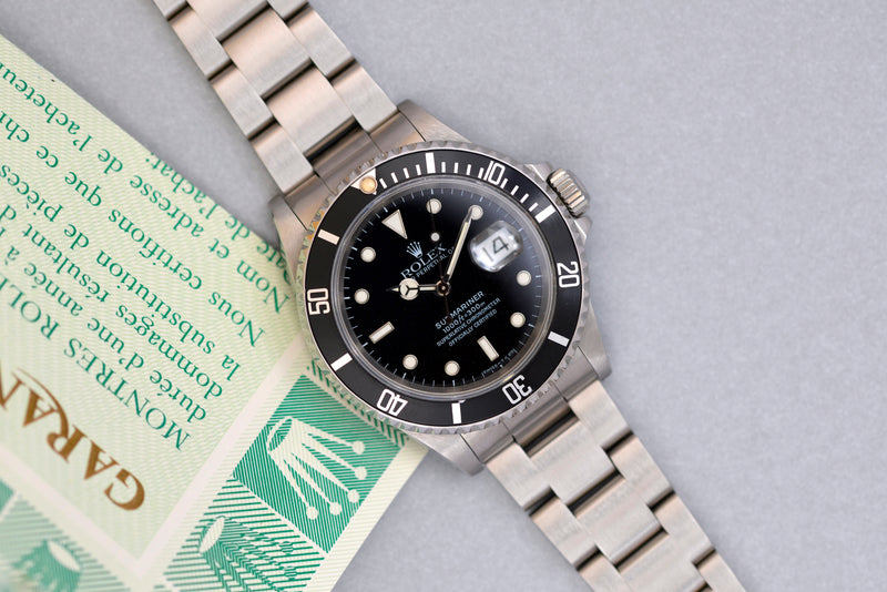 1991 Rolex Oyster Perpetual Submariner Date 16610 with papers